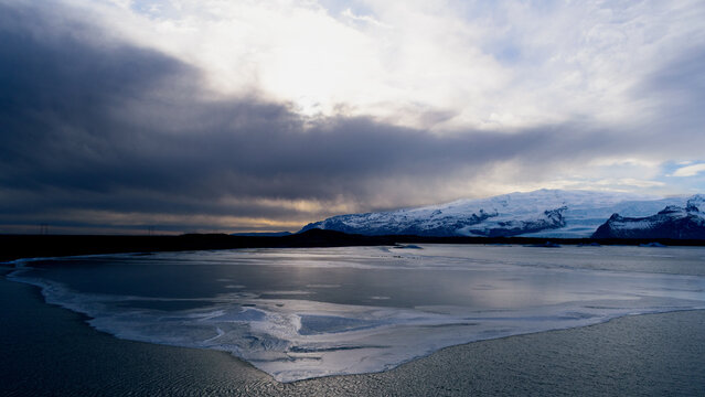 Dramatic Sunset Sky Over Icelandic Mountain Lake