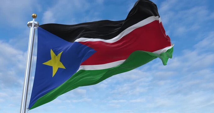 South Sudan flag with flagpole waving in wind, rolling clouds background looping, 4K video (Perfect Loop)