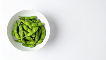 Delicious salted edamame pods in a white bowl ready to enjoy as a healthy snack