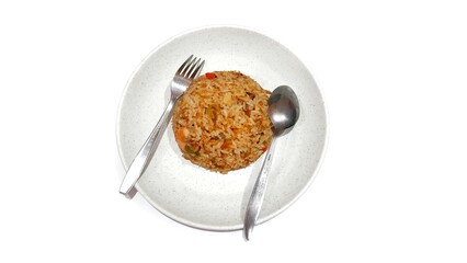 Seafood fried rice served on white plate isolated on white background. Food presentation business