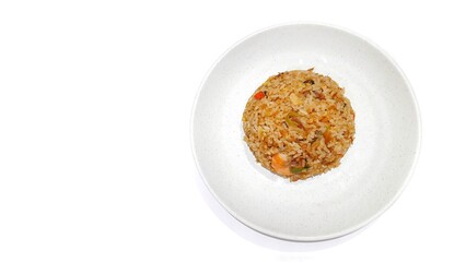 Seafood fried rice served on white plate isolated on white background. Food presentation business