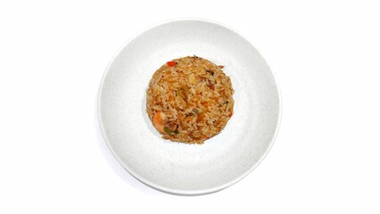 Seafood fried rice served on white plate isolated on white background. Food presentation business