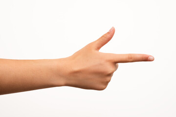 Human hand with extended index finger pointing right, isolated on a white background. Suitable for...