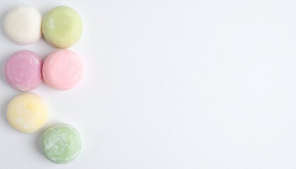 Vibrant pastel mochi sweets arranged artfully creating a delightful culinary visual for promotions