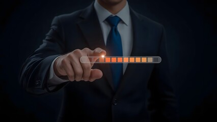 Businessman initiating data transfer or system process, indicated by a glowing orange loading progress bar on a futuristic interface. 