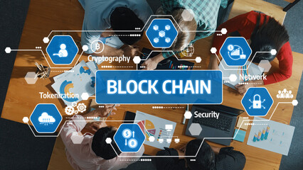 A diverse team engages in a productive meeting focused on blockchain technology, surrounded by graphics illustrating concepts such as security and cryptocurrency advancements. Amity