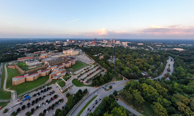 Various Sunset Drone Images of Downtown Raleigh NC Featuring the Skyline, Dix Park, and Central Prison.