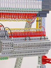 Electrical terminals with connected insulated copper wires with metal lugs. Marking with a thermal...