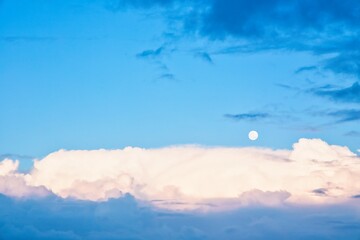 Sky replacement of New Zealand clean blue sky, white clouds and the moon.