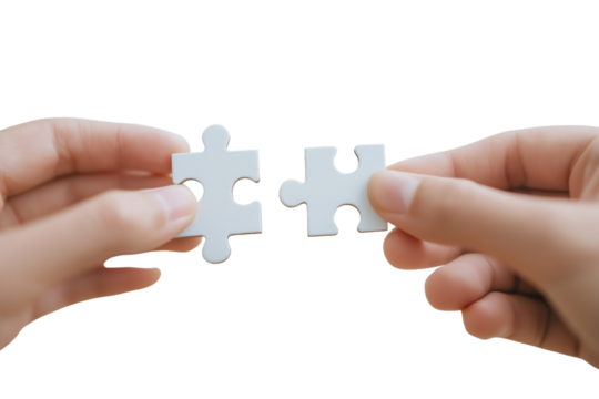 Two hands holding white jigsaw puzzle pieces about to connect isolated on a transparent background connection