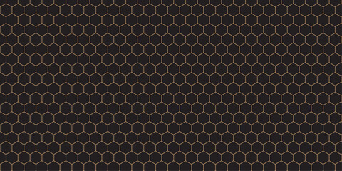 Black and white carbon fiber with a metallic honeycomb grid pattern, ideal for industrial design backgrounds