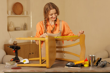 Woman Repairing Wooden Chair in Home Workshop