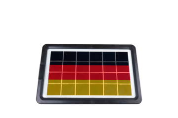 A solar panel displaying the German flag's colors is isolated against a transparent background, symbolizing Germany's commitment to sustainable energy and green technology