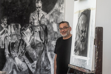Artist in his painting studio, in Villa Giardino, Córdoba, Argentina.
