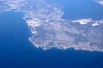 Aerial View of Coastal Landscape Highlighting Urban and Natural Features. Expansive coastline...