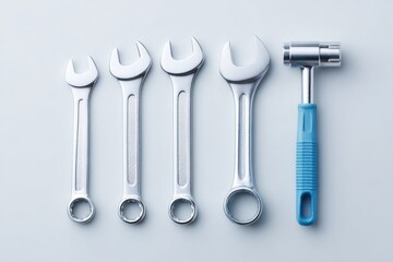 neatly arranged set of simple tools laid against clean white background symbolizes concept of reliability