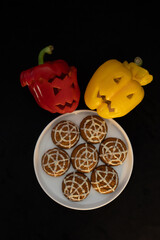 Jack o lantern bell pepper and cookies with spider webs