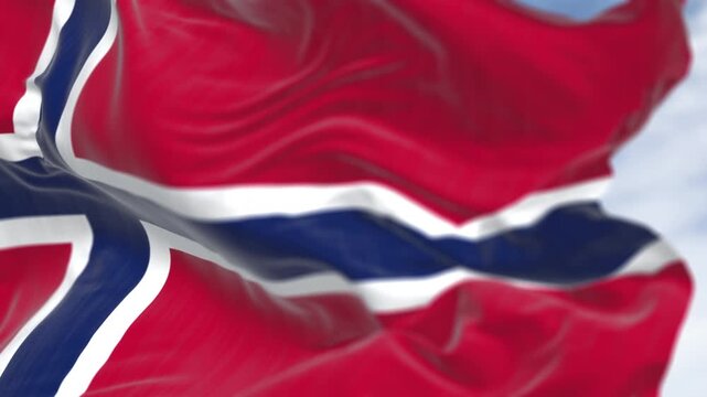 Norway national flag waving in the wind on a clear day - Powered by Adobe