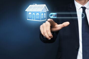 Real estate agent using virtual screen with search bar and house against dark blue background, closeup. Searching for housing online