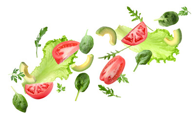 Fresh vegetables for salad flying against white background