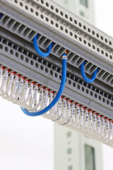 Electrical screw terminals for connecting wires in an electrical switchboard. Soft focus. Close-up.