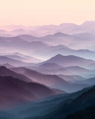 A serene landscape of misty mountains layered in shades of blue and purple creates a dreamy vista