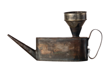 Old vintage rusty oil can isolated on white background