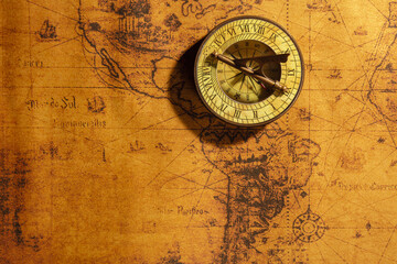 Travel geography background. Old vintage compasson geographical vintage atlas map of the world with North and South America