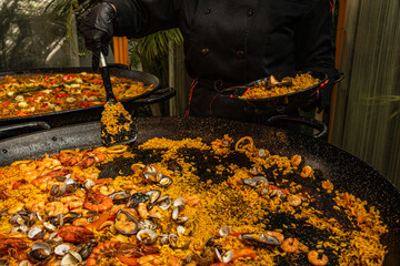 Preparing a delicious seafood paella