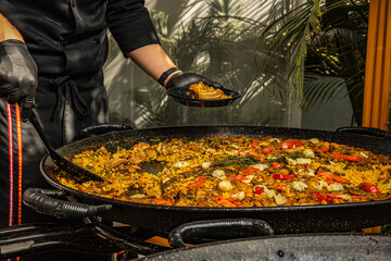 Preparing a delicious seafood paella