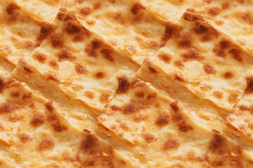 Fototapeta premium Seamless pattern of delicious baked lasagne. Food background with golden brown cheese. Abstract texture for food design.