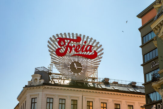 Freia Chocolate Sign: Iconic Rooftop Landmark in Oslo's Cityscape