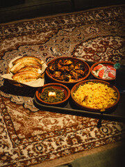Traditional Desi Dinner on Carpet