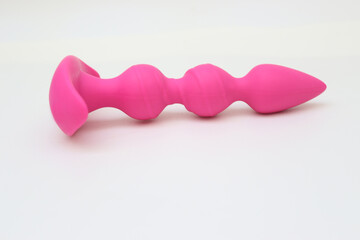 Pink sex toys on a light background
