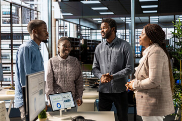 Entrepreneur and his staff discuss resource allocation and budget planning for an upcoming...