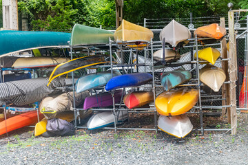 Paddles ready in Washington’s heart
Kayaks await on a calm day beneath a historic bridge.