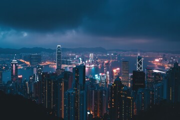 City skyline at night with dramatic clouds