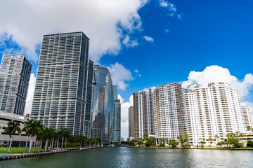 Fototapeta premium Aerial view of Brickell skyline in downtown Miami. Modern skyscrapers rise above Biscayne Bay. Miami Urban landscape with iconic buildings. Miami cityscape.