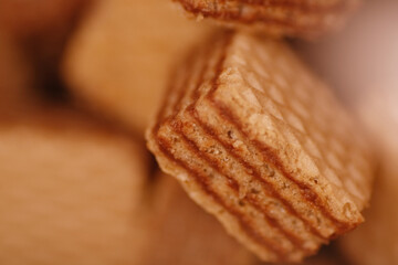 Close up texture of cube wafer biscuit with layer of hazelnut
