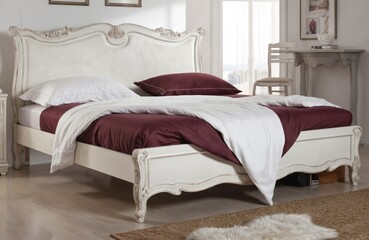 Minimalist bedroom features Antique White bed with burgundy bedding. Soft white pillows, duvet complement rich burgundy sheets. Chic, modern room offers cozy, inviting atmosphere. Neutral color