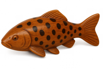 Handcrafted wooden fish sculpture featuring black spotting, representing marine motif against transparent backdrop