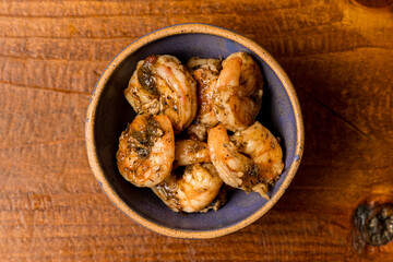 Grilled shrimp in a small bowl