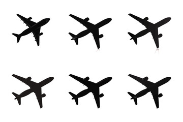 Airplanes Silhouettes in the Sky: A collection of striking silhouettes of airplanes, soaring against the expansive sky, symbolizing travel, adventure, and the thrill of flight.