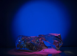 cosmetic background podium with ice and stones.real ice and stones with texture for presentation of...