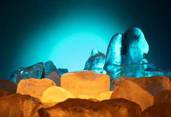 cosmetic background podium with ice and stones.real ice and stones with texture for presentation of...
