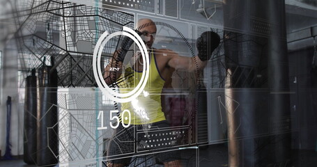 Striking boxer in yellow tank top and black gloves inside gym, with punching bag, digital interface