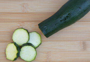 Zuchinni slices on cutting board