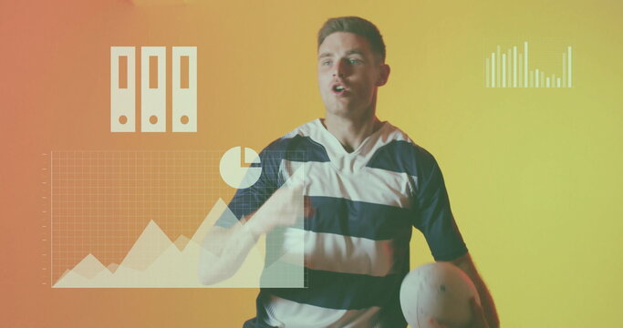 Presenting sports data wearing striped jersey and holding white ball in studio, with data graphics