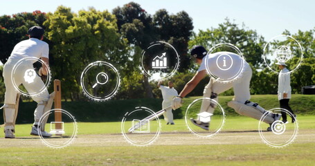 Bowler delivering ball and batsman lunging with bat in grass pitch, with digital icons, copy space
