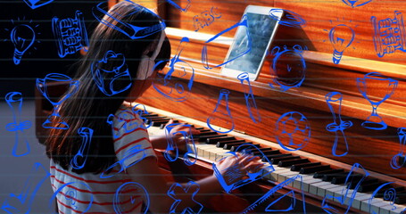 Chinese girl playing piano at home, wearing headphones, striped shirt with tablet and blue doodles